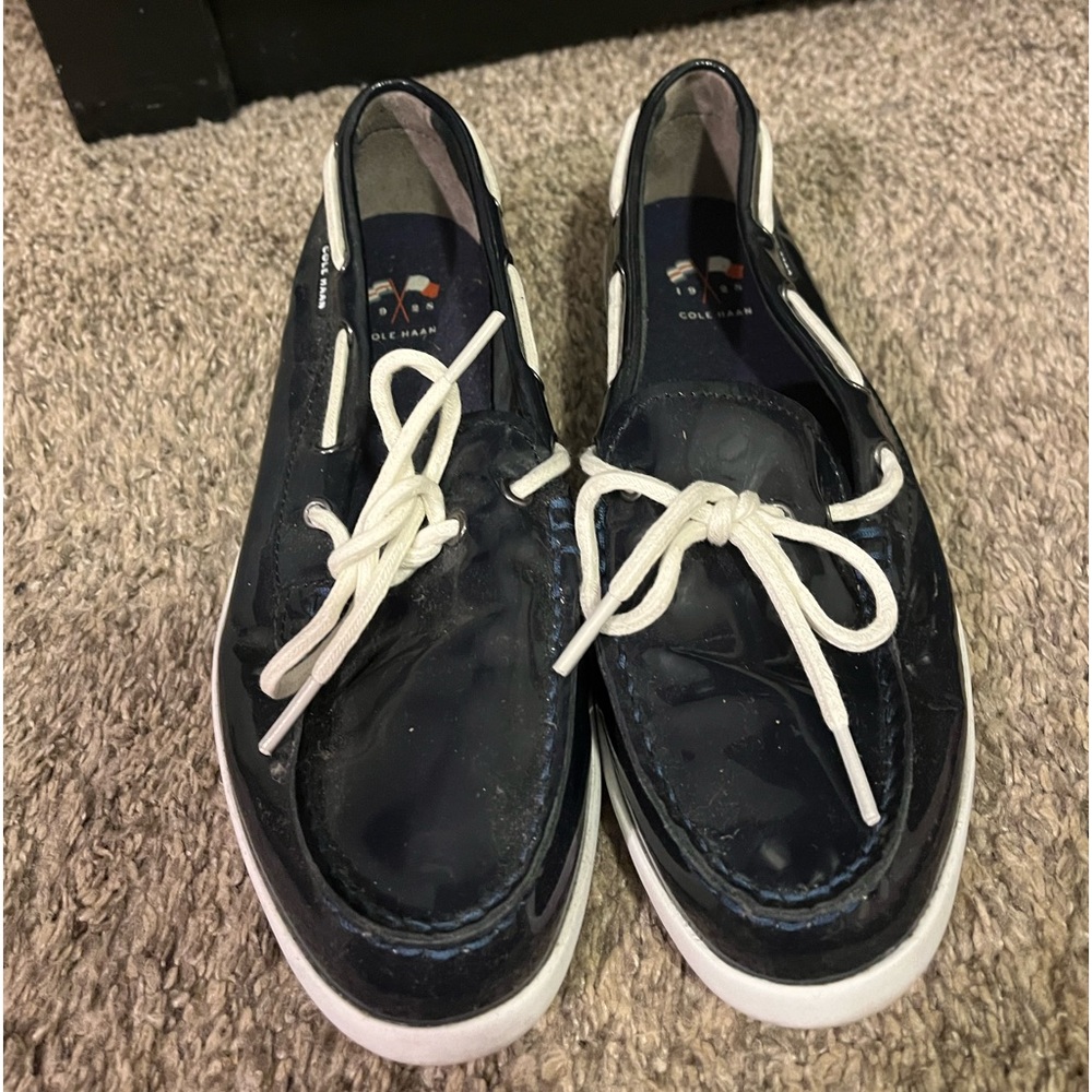 Cole Haan navy patent leather slip on moccasin boat shoe